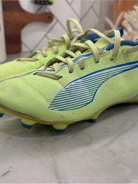 Puma Kids Blue and Yellow outdoor soccer cleats